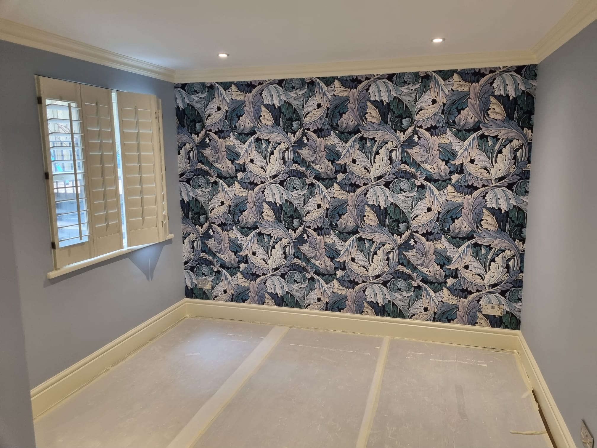 Wall Insulation and Decorative Wall Paper Installation